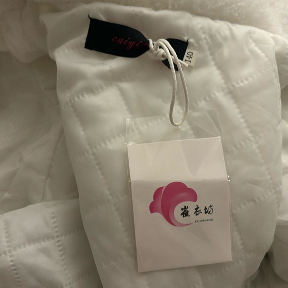 Fluffy white winter coat jacket with dark brown buttons - Picture 1 of 3